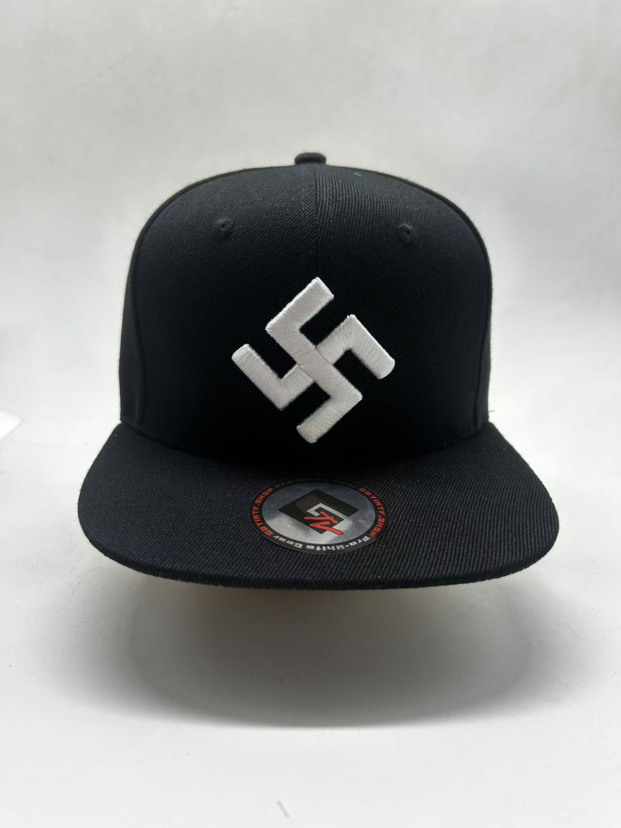 White Swastika • Black
